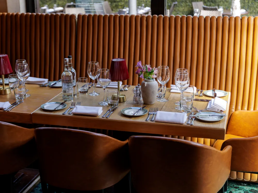 A long table set by the booth at Smith's Bar & Grill
