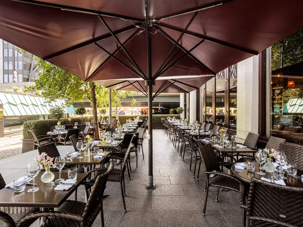 The terrace under the umbrellas at Smith's Bar & Grill