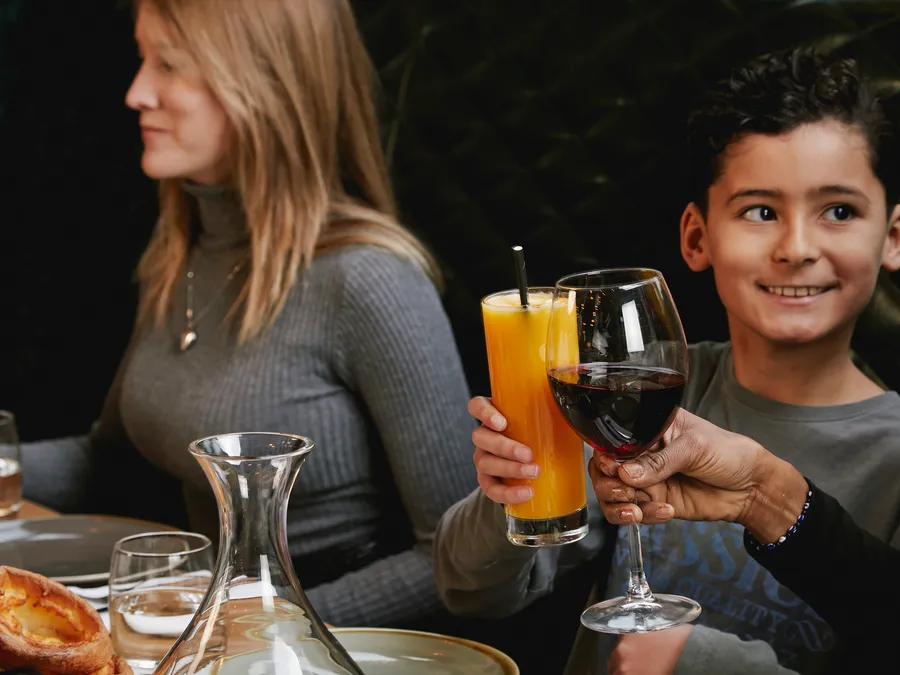 A family raising a glass at Christmas lunch at Smith's Bar & Grill